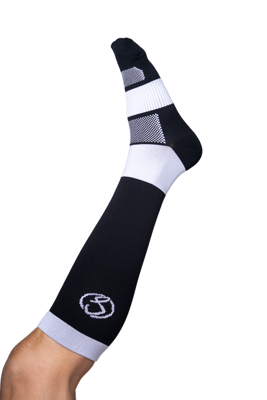 Black and white knee-high sock with a logo on a white background
