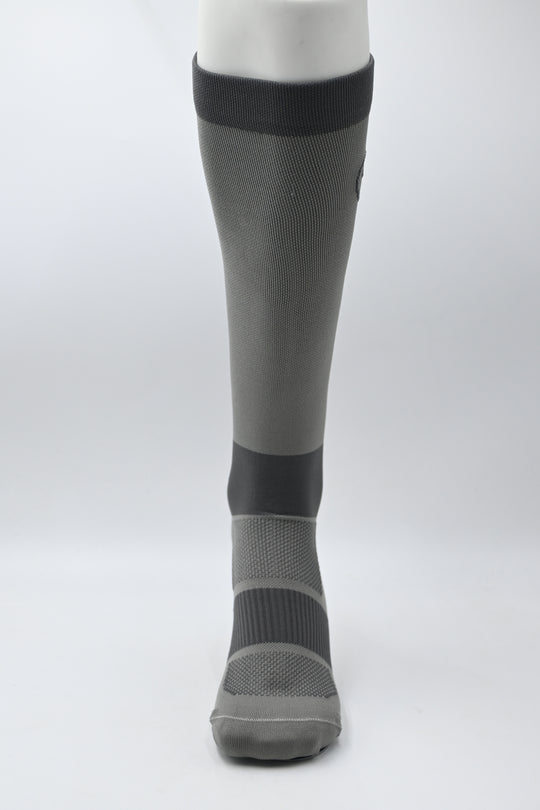 Gray compression sock on a white background