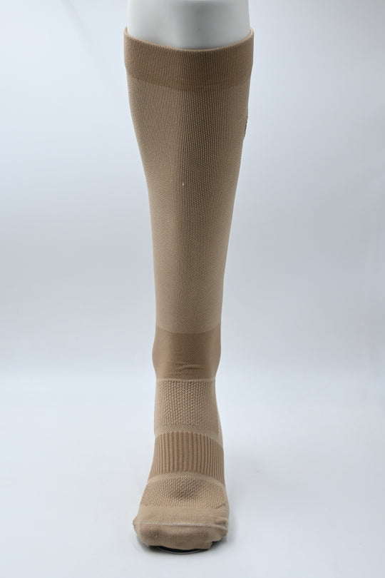 Brown compression stocking on a white background